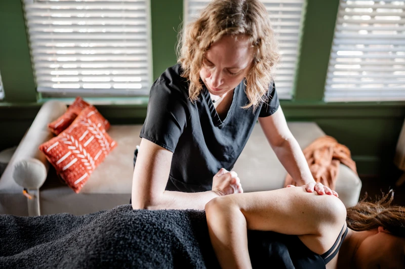 prenatal massage side lying elbow in glute_converted Corrective Touch Massage Therapy - Pilot Point TX